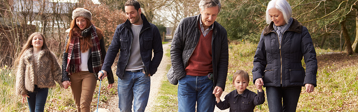 3 generation family walking outside