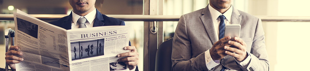 Men sitting and reading news