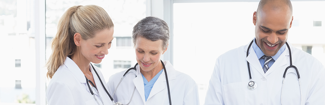 group of doctors discussing a chart