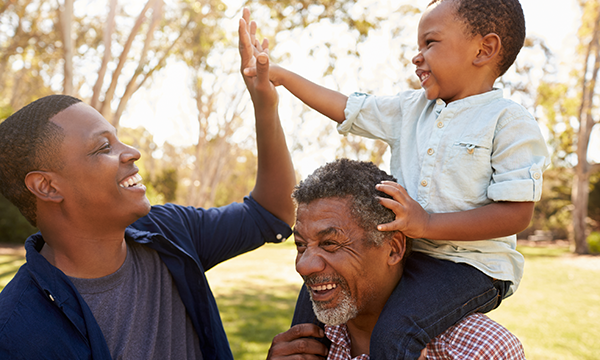 father and grandfather with child