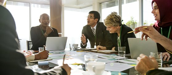 business men and women at a meeting